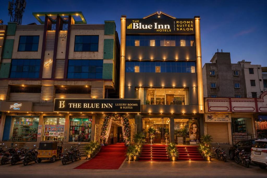 The Blue Inn Hotel facade at night